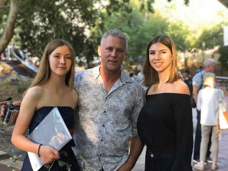 Jade Snel with her father and sister at her sister's graduation.