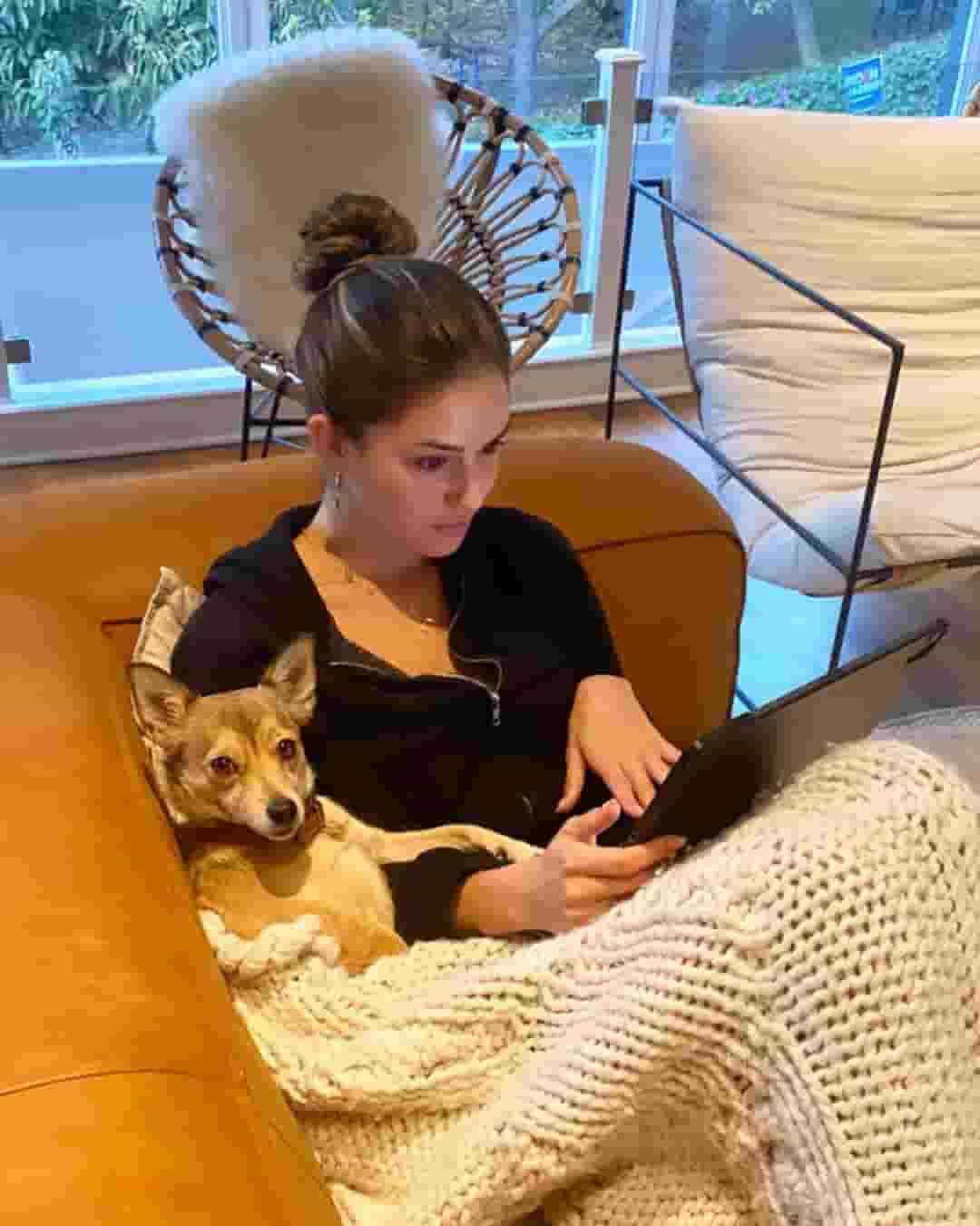 Gigi Paris with her pet dog Oats.