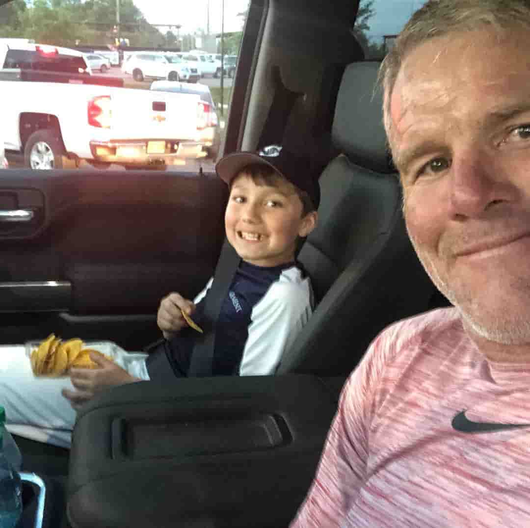 Brett Favre with his grandkid Parker.