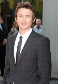 Marshall Allman at the premiere of 'Prison Break' season 5 in a black suit and black tie