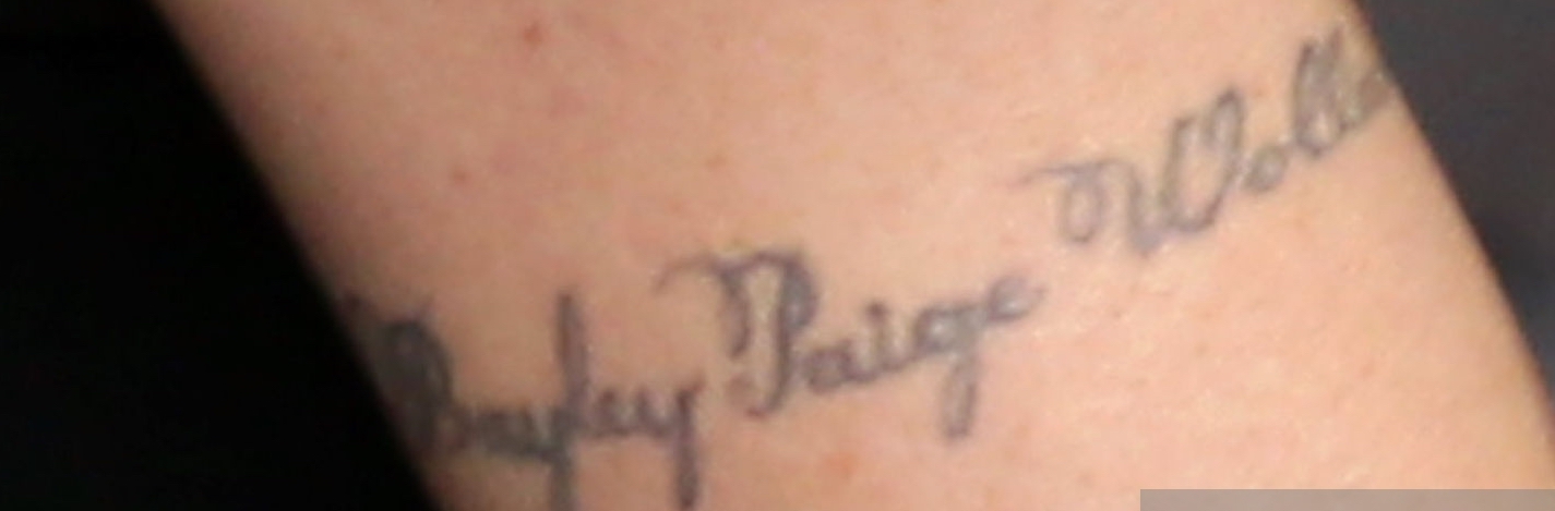 Tattoo on Teri Polo's arms reading 'Hayley Paige Wollam'