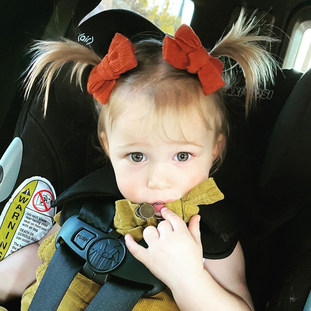 Adorable baby Banks awaiting a drive to school