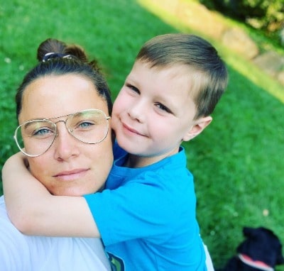 S.E. Cupp with her son