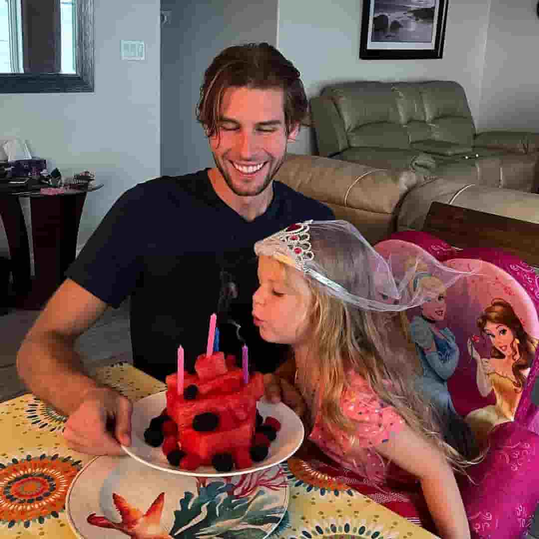 Andrey Korikov celebrating his daughter's birthday together.