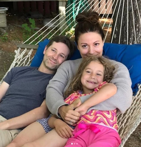 husband-wife duo Eben Russell and Kay Cannon with their daughter
